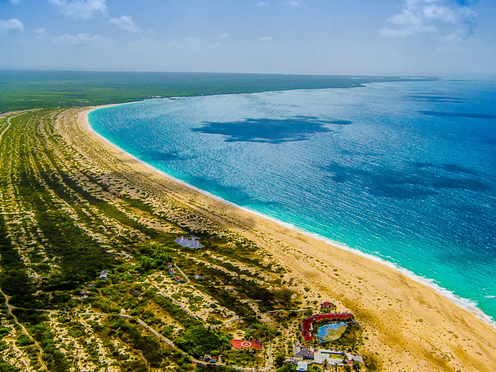 Visit famous Frigate Bird Sanctuary and pink sand beaches